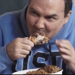 Norm eating chicken