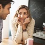 woman smile stare at young man