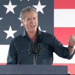 Gavin Newsom desecrates flag