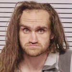 Caveman Mugshot