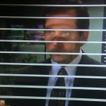 Micheal Scott behind blinds