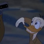 Donald Duck reaching out for gun