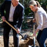 Trump woman digging a hole law of holes