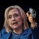Hillary waiving gun
