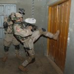 Soldier Breaking Down Door