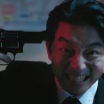 Squid Salesman pointing gun at himself