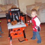 Kid beside a playset