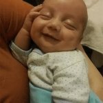Smiling sleeping baby