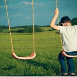 Sad kid swing