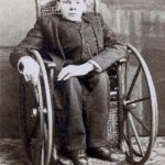 Vintage picture of man in wheelchair crippled
