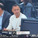 Sark watching hoops team lose