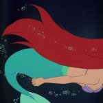 Ariel swimming away from home
