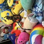Claw Stuck in a pile of stuffed toys