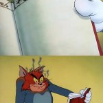 Angry Tom reading a book