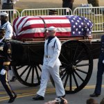 Presidential caisson funeral flag-draped coffin Reagan