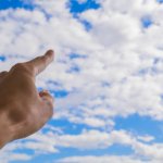 finger pointing to the sky