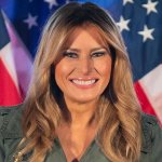 Melania Trump smiling American flag