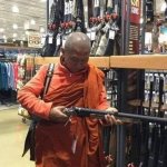 monk with gun