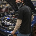 Beige-Sleeved Alexander Tuning A Car template