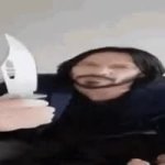 Keanu reeves menacingly holding a knife GIF Template