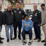 Handcuffed Maduro thumbs up