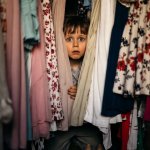 Arbie hiding in his mom's closet
