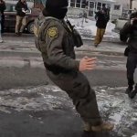 An ICE Agent slipping on an ice