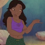 Nani Pelekai Wearing a Purple Top and Green Pants