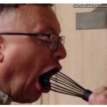 Rich licking batter off the whisk.