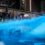 Japan sprays looters and rioters with blue dye meme