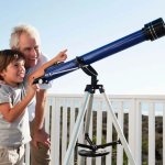 Grandfather Grandson Stargazing Together