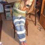 Tied with rope on a chair