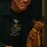 Jim Carrey offering a fried alive rat meme