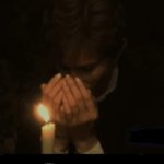 prayer w/ a lit candle