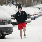 guy in shorts in the snow