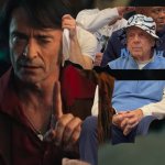 Roy in the hat sitting beside Hugh Jackman!