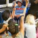 Roy in the hat in class