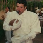 Bad Bunny holding Football