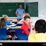 me whispering in class