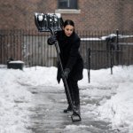 AOC shoveling snow