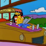 Otto sunbathing on the schoolbus