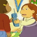 Muffy handing phone