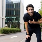 Man catching his breath out of breath