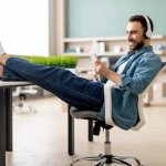 man chilling with feet up on the table