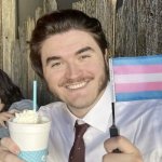 Jschlatt holding a trans pride flag