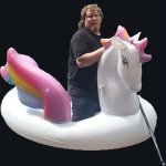 Man on a unicorn floatie