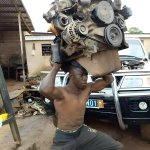 Guy Holding Engine