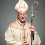 Priest with a staff