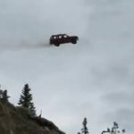 car drives off cliff alternate GIF Template