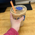 Angrily choking coffee